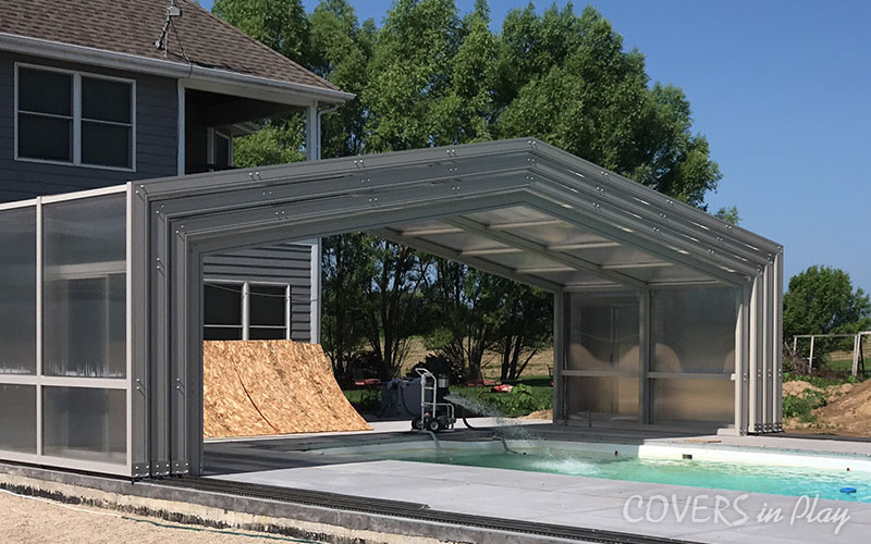 Two story Retractable Pool Enclosure opens with ease