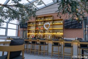 Maximizing outdoor seating with retractable structures