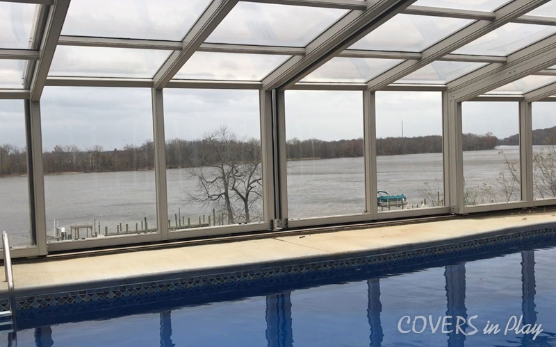 Retractable Pool Enclosure beside the river