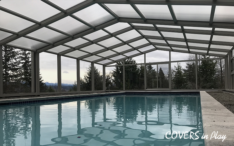  Interior view of pool with dome in Edgewood, VA, with lush forestry in the background