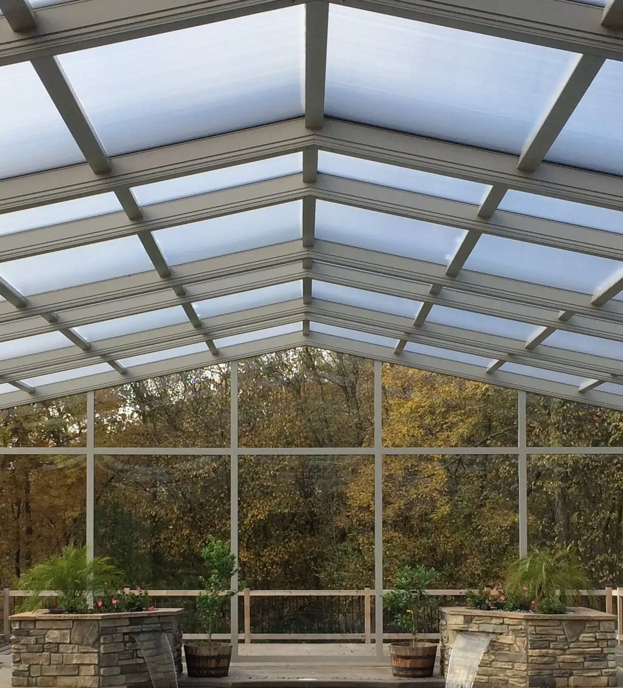Polycarbonate roof glazing for pool enclosure